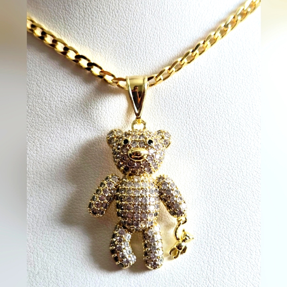 Cuban chain 22 inch bear pendant with your own bear in one hand. Laminated gold
